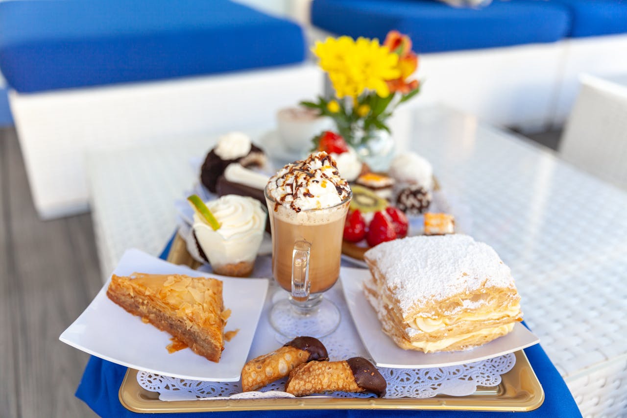 Crafting Captivating Headlines: Your awesome post title goes here A tempting assortment of desserts with a frothy coffee, perfect for indulgence.